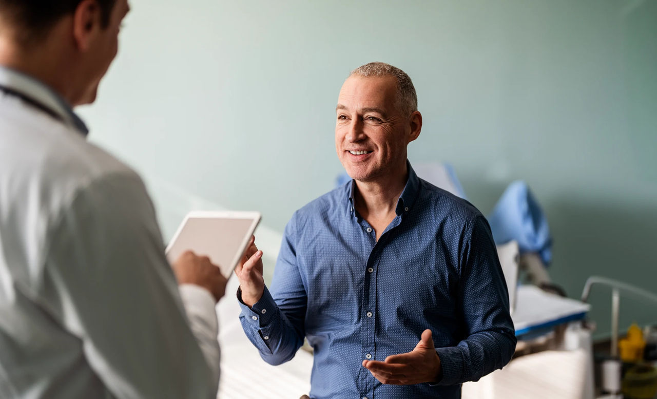 patient talking to their doctor