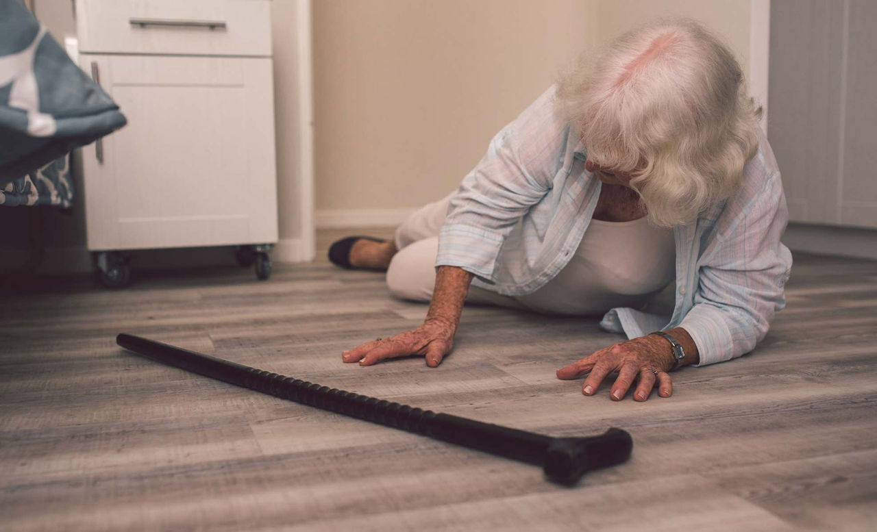Senior that has fallen with her cane