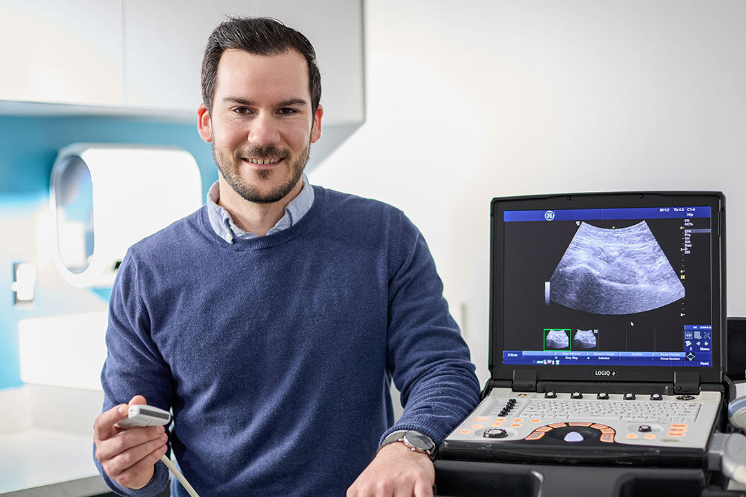 Physician performing an ultrasound